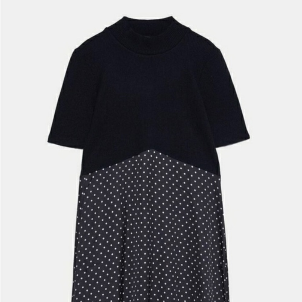 Brand new midi dress with round neckline and short sleeves.